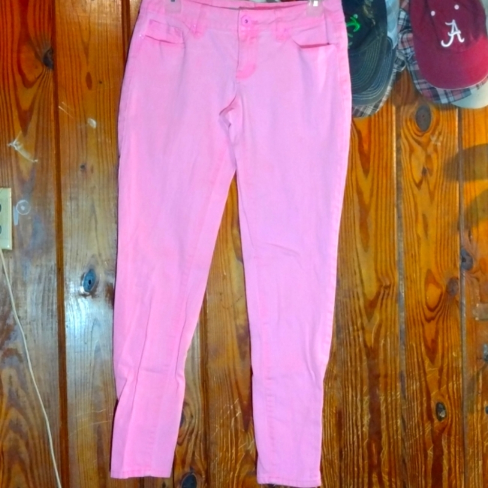 Bright pink skinny jeans